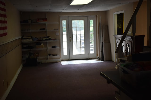 101 Bob St, Selmer, TN 38375 - entryway with carpet, healthy amount of natural light, and a paneled ceiling