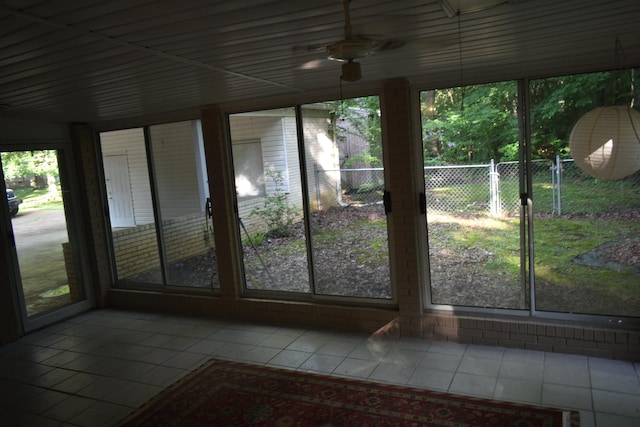 101 Bob St, Selmer, TN 38375 - unfurnished sunroom featuring tile patterned floors