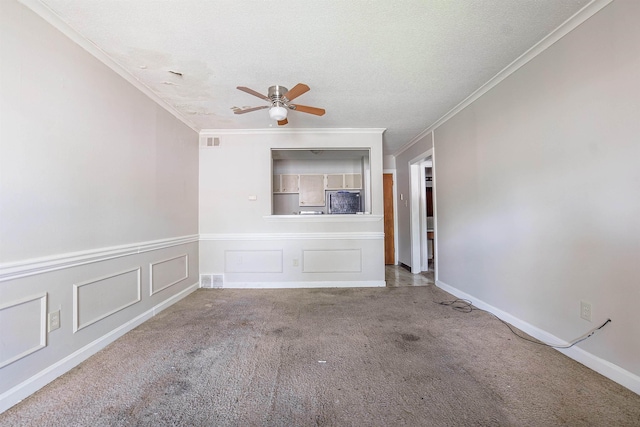 3229 Thirteen Colony Mall Unit 5B, Memphis, TN 38115 - carpeted spare room with ornamental molding, ceiling fan, a textured ceiling, and wainscoting