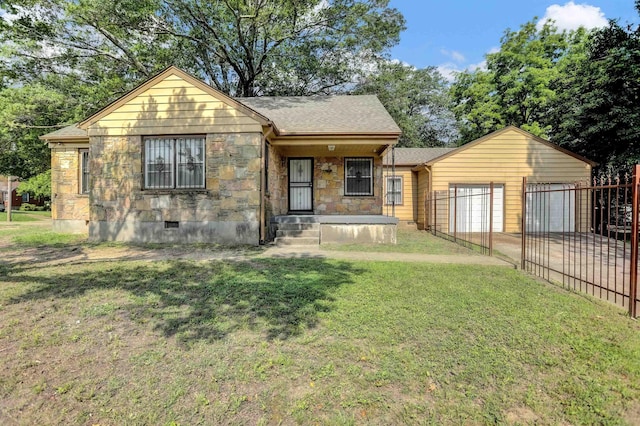 3257 Millington Rd, Memphis, TN 38127 - bungalow-style house with an attached garage, stone siding, crawl space, covered porch, and driveway