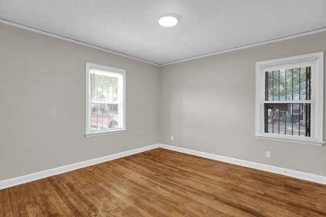 3257 Millington Rd, Memphis, TN 38127 - spare room featuring crown molding and wood finished floors