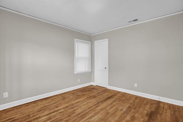 3257 Millington Rd, Memphis, TN 38127 - unfurnished room with wood finished floors and crown molding
