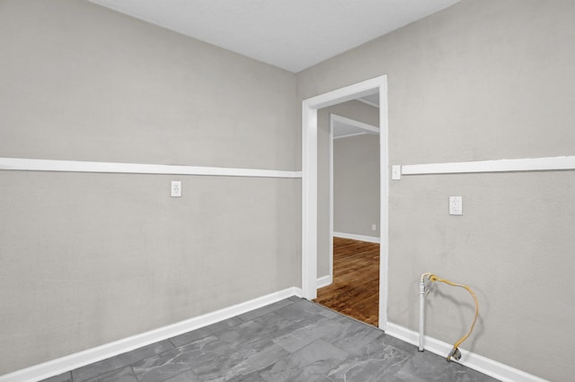 3257 Millington Rd, Memphis, TN 38127 - unfurnished room with baseboards and marble look tile flooring