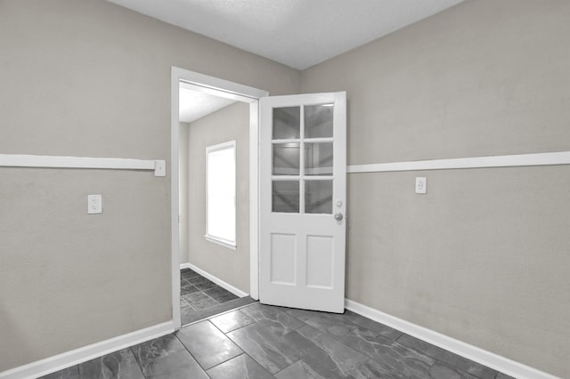 3257 Millington Rd, Memphis, TN 38127 - entryway with dark marble finish floors and baseboards