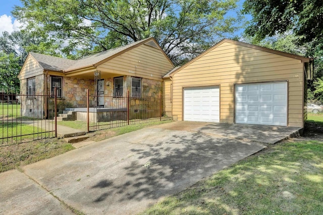 3257 Millington Rd, Memphis, TN 38127 - view of front of house with a porch, stone siding, an outbuilding, a garage, and roof with shingles