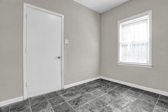 3257 Millington Rd, Memphis, TN 38127 - spare room with healthy amount of natural light and a textured ceiling