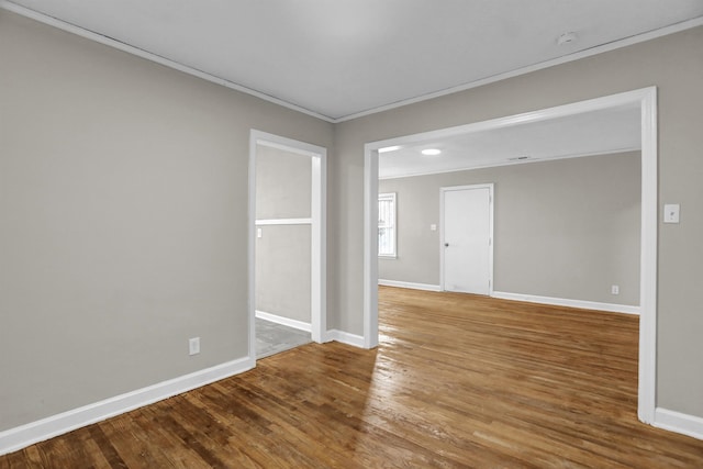 3257 Millington Rd, Memphis, TN 38127 - empty room featuring ornamental molding, wood finished floors, and a smoke detector