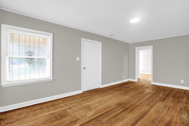 3257 Millington Rd, Memphis, TN 38127 - spare room featuring ornamental molding and wood finished floors