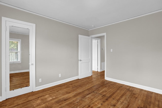 3257 Millington Rd, Memphis, TN 38127 - unfurnished room featuring crown molding and wood finished floors