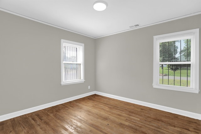 3257 Millington Rd, Memphis, TN 38127 - unfurnished room with crown molding and wood finished floors
