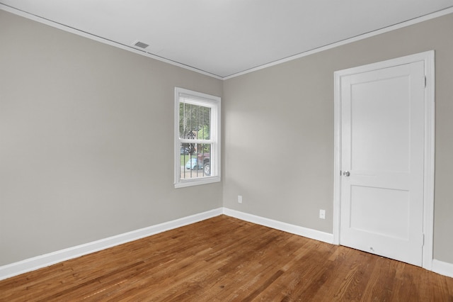 3257 Millington Rd, Memphis, TN 38127 - unfurnished room featuring crown molding and wood finished floors