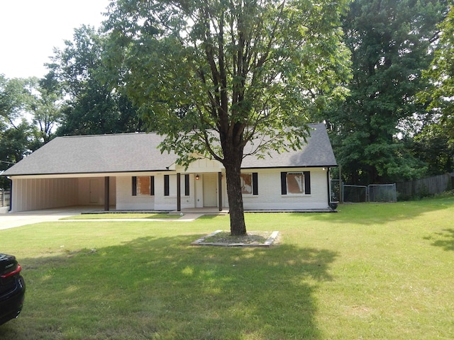 1849 Townsend Ave, Memphis, TN 38127 - view of front of home with a shingled roof, driveway, and an attached carport