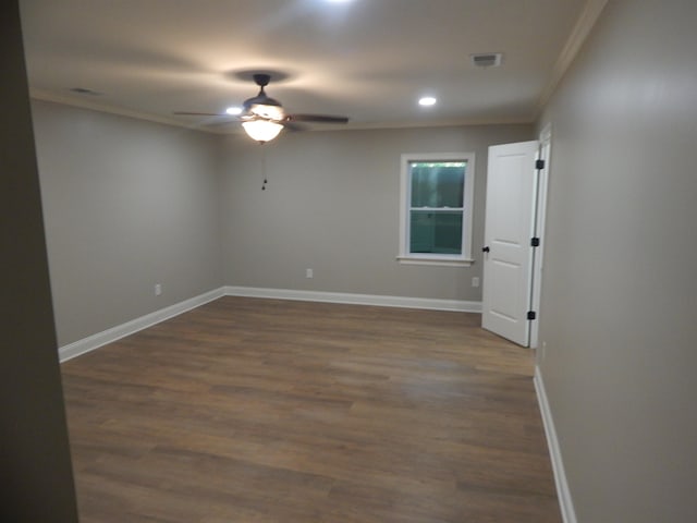 1849 Townsend Ave, Memphis, TN 38127 - spare room with ornamental molding, ceiling fan, dark wood-style flooring, and recessed lighting