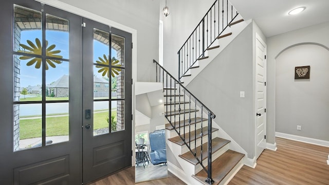 720 Woodland Fox Cv, Cordova, TN 38018 - foyer entrance featuring wood finished floors, healthy amount of natural light, and stairs