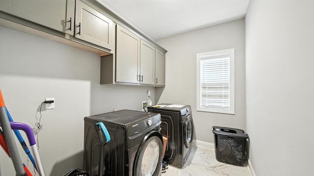 720 Woodland Fox Cv, Cordova, TN 38018 - washroom with light marble finish flooring, washer and dryer, and cabinet space