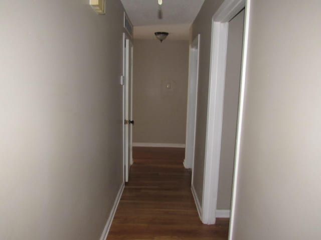 4632 Plato Ave, Memphis, TN 38128 - hall featuring dark wood-style floors and baseboards