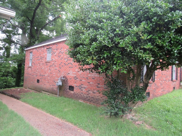 4632 Plato Ave, Memphis, TN 38128 - view of home's exterior featuring crawl space and brick siding
