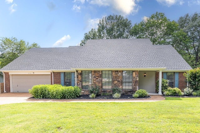 2539 Kenwood Rd, Bartlett, TN 38134 - view of front of house featuring an attached garage, a front lawn, brick siding, driveway, and roof with shingles