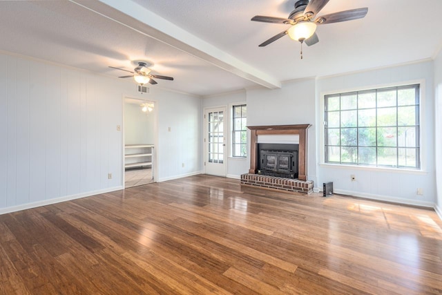 2539 Kenwood Rd, Bartlett, TN 38134 - unfurnished living room featuring a ceiling fan, wood finished floors, and a fireplace