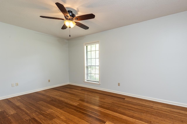 2539 Kenwood Rd, Bartlett, TN 38134 - empty room featuring dark wood-style flooring and a ceiling fan