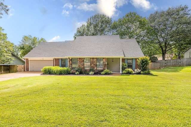 2539 Kenwood Rd, Bartlett, TN 38134 - view of front of house featuring brick siding, concrete driveway, and a garage