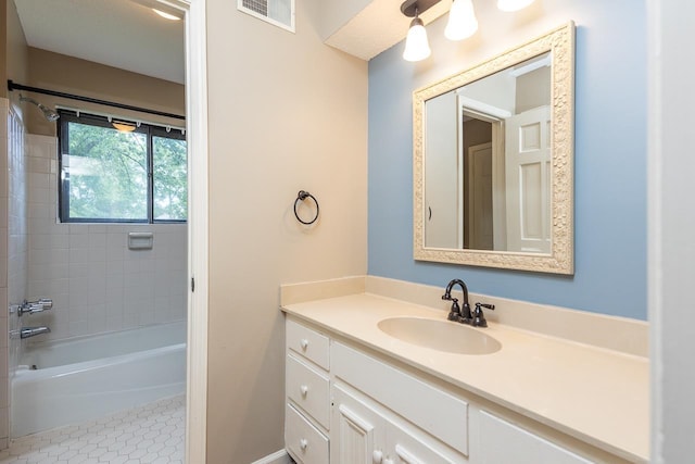 2539 Kenwood Rd, Bartlett, TN 38134 - bathroom featuring vanity, tile patterned floors, and tub / shower combination