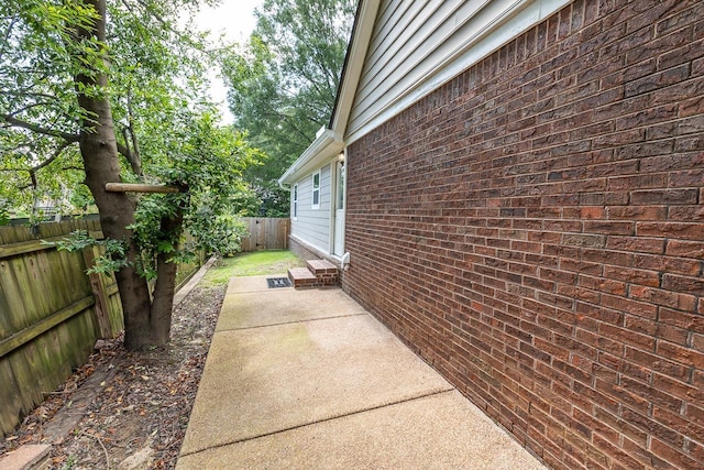 2539 Kenwood Rd, Bartlett, TN 38134 - fenced backyard featuring a patio area