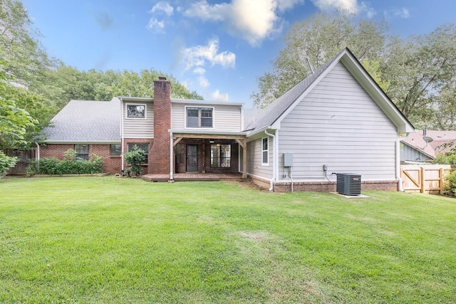 2539 Kenwood Rd, Bartlett, TN 38134 - back of house with a chimney