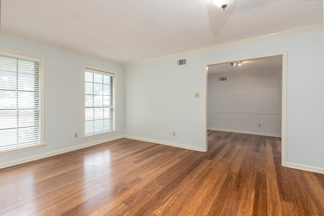 2539 Kenwood Rd, Bartlett, TN 38134 - spare room with ornamental molding, wood finished floors, and a textured ceiling