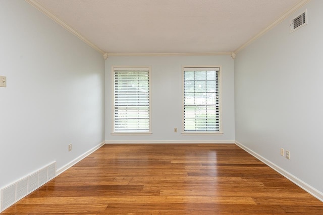 2539 Kenwood Rd, Bartlett, TN 38134 - spare room with ornamental molding and wood finished floors