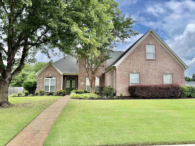 6632 W Thriveaway Cv, Bartlett, TN 38135 - traditional-style home featuring brick siding and roof with shingles