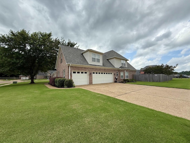 6632 W Thriveaway Cv, Bartlett, TN 38135 - view of front of house featuring brick siding, an attached garage, concrete driveway, and a shingled roof