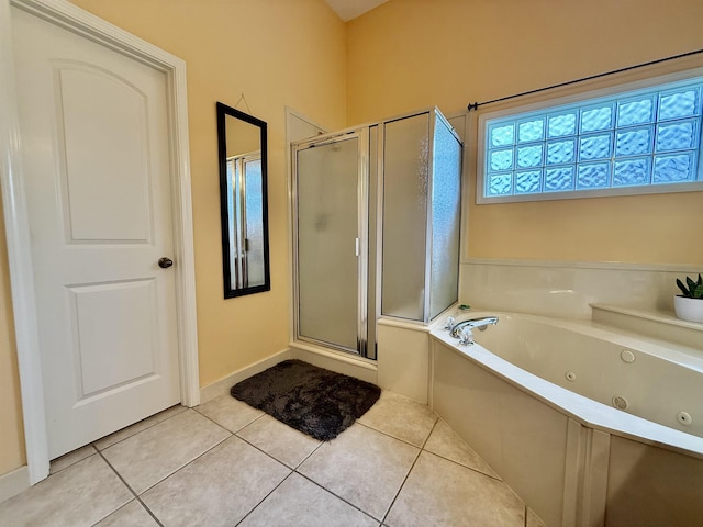 6632 W Thriveaway Cv, Bartlett, TN 38135 - full bath with a stall shower, a whirlpool tub, and tile patterned flooring