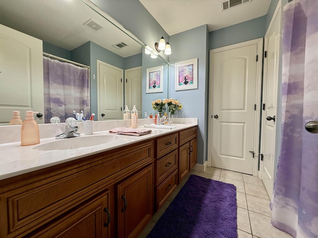 6632 W Thriveaway Cv, Bartlett, TN 38135 - full bathroom with double vanity and tile patterned floors