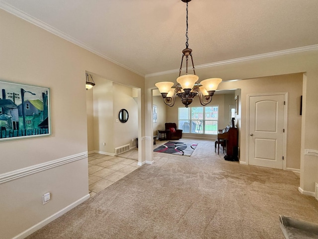 6632 W Thriveaway Cv, Bartlett, TN 38135 - carpeted dining room featuring a chandelier, crown molding, and tile patterned flooring