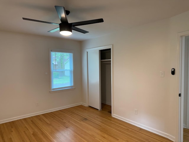 3652 Acacia St, Memphis, TN 38116 - unfurnished bedroom with light wood-style floors, a closet, and ceiling fan