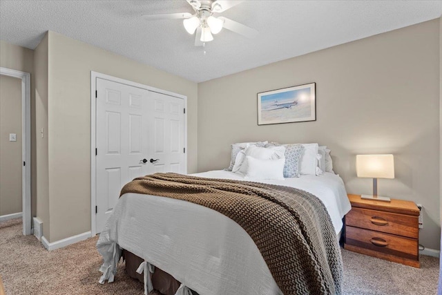 3077 Stonecrest Cir E, Lakeland, TN 38002 - bedroom featuring light colored carpet, a closet, and ceiling fan