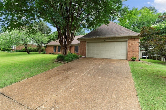 3077 Stonecrest Cir E, Lakeland, TN 38002 - view of front of property with brick siding, a front yard, and a shingled roof