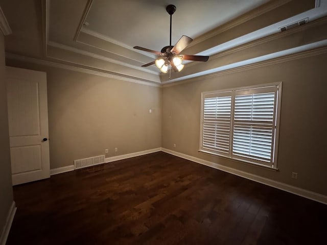 10040 Dropseed Cir, Lakeland, TN 38002 - spare room with a tray ceiling, ceiling fan, wood finished floors, and crown molding