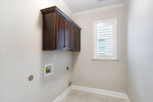 10040 Dropseed Cir, Lakeland, TN 38002 - laundry room with electric dryer hookup, crown molding, washer hookup, light tile patterned floors, and cabinet space