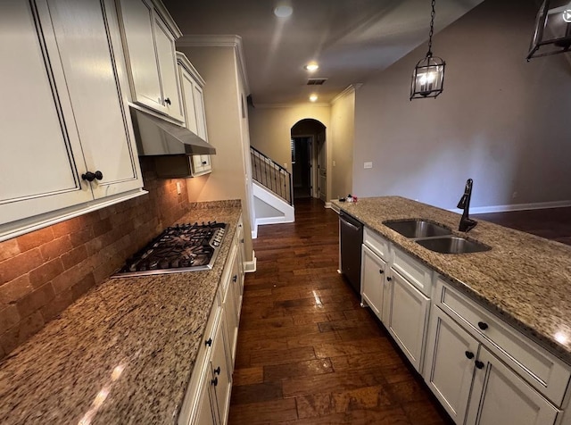 10040 Dropseed Cir, Lakeland, TN 38002 - kitchen featuring stainless steel appliances, arched walkways, under cabinet range hood, dark wood finished floors, and light stone counters