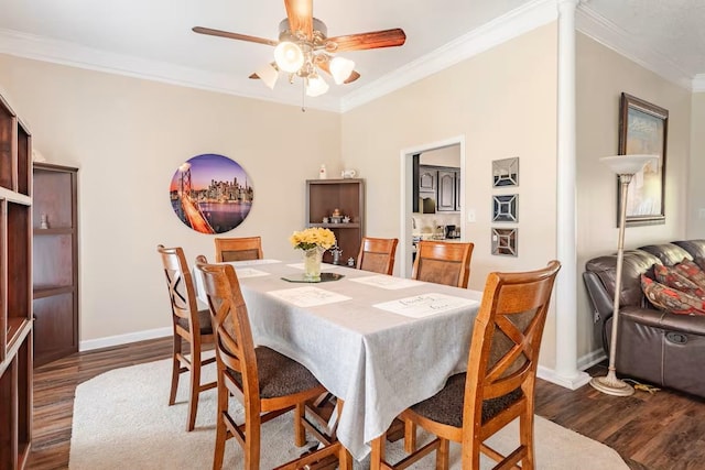 4740 Dustin Place Dr, Southaven, MS 38671 - dining area with dark wood-style flooring, crown molding, and a ceiling fan