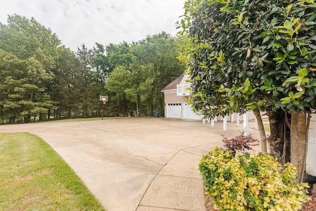 4740 Dustin Place Dr, Southaven, MS 38671 - view of property exterior with concrete driveway and an attached garage