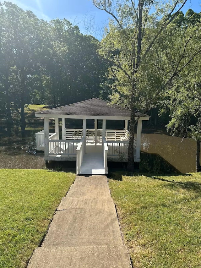 4740 Dustin Place Dr, Southaven, MS 38671 - view of front facade with a front lawn, a gazebo, and a shingled roof