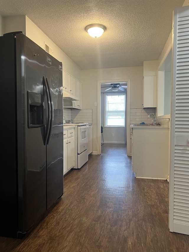 3603 Bigelow St, Memphis, TN 38127 - kitchen with fridge with ice dispenser, white range with electric cooktop, dark wood-type flooring, ceiling fan, and under cabinet range hood