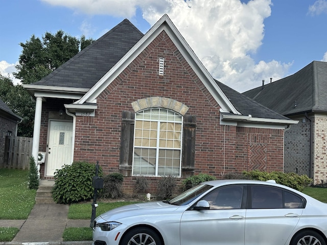 1582 Wynne Grove Dr, Cordova, TN 38016 - view of front of property with brick siding and a shingled roof