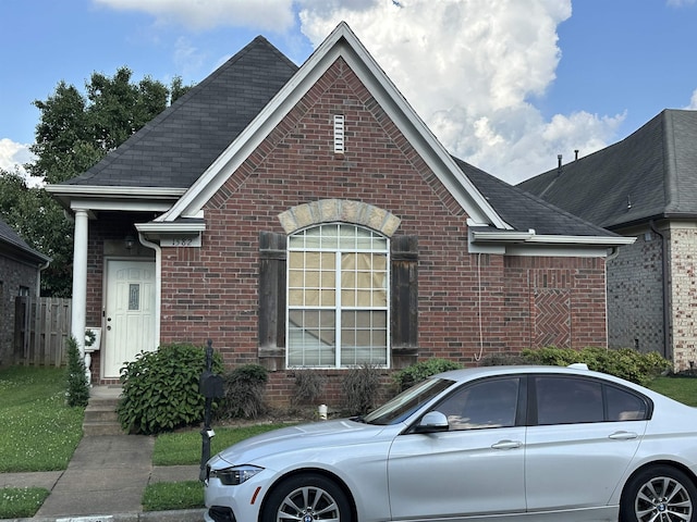 1582 Wynne Grove Dr, Cordova, TN 38016 - view of front of house with brick siding and a shingled roof