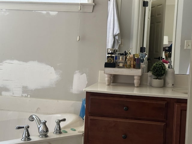 1582 Wynne Grove Dr, Cordova, TN 38016 - bathroom featuring vanity and a garden tub