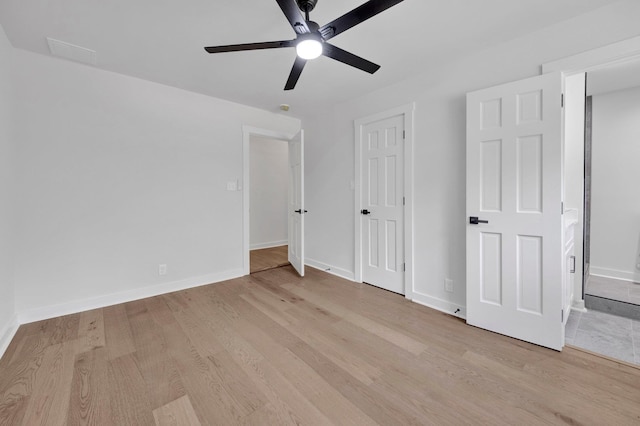 9700 N Helene Cv, Millington, TN 38053 - unfurnished bedroom with light wood-type flooring and ceiling fan