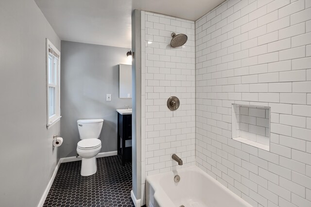 3218 Joffre Ave, Memphis, TN 38111 - bathroom featuring vanity, washtub / shower combination, and tile patterned floors